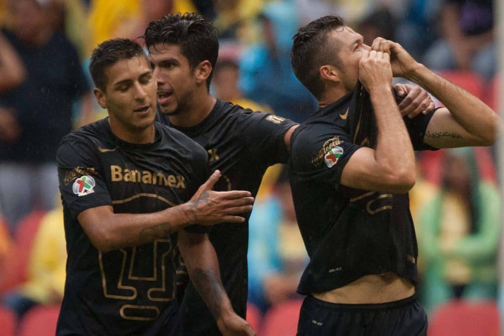 Dante Lopez R of UNAM s Pumas celebrates after scoring during the match of the MX League Opening T